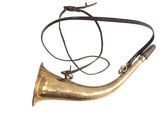 a brass horn with a leather strap on it