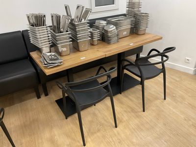 a table with a lot of plates and pans on it