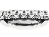 an image of a close up of a metal object on a white surface