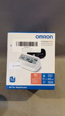 une boîte contenant un tensiomètre numérique