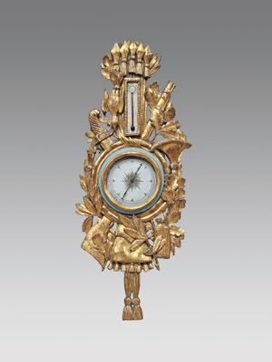 une image représentant une horloge dorée sur fond blanc, avec un fond gris