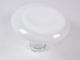 an image of a close up of a white knob on a white surface