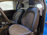 a blue car with two seats in the back of it