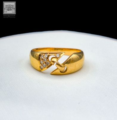 Bague en or jaune 18K 750/°°° poinçon tête d'aigle sertie de…