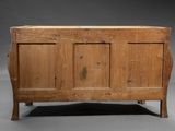 a wooden chest with a wooden top on a gray background