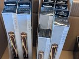 boxes of electronic gadgets are sitting on top of a cardboard box