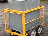 a small cart that has a large container on it