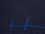 a close up of a black shirt with a blue heartbeat on it