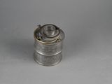 an old silver metal canister with a handle on a white surface