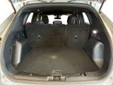 a trunk of a car with the back seats down