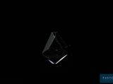 un gros plan d'un diamant noir sur fond noir