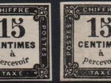 two stamps with the date 15 cents and the date 15 cents on them