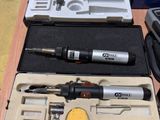 many different types of tools in a case on a table