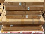 many boxes stacked on top of each other in a warehouse