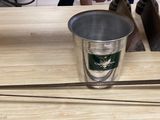 two swords that are sitting on a table