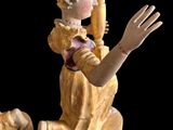 a statue of a woman holding a baseball bat next to a shoe