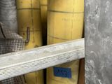 two yellow fire hydrants that are in a box