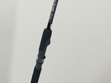 a close up of a fishing rod on a white surface