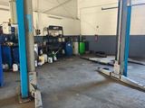 an image of a garage with a lot of equipment in it