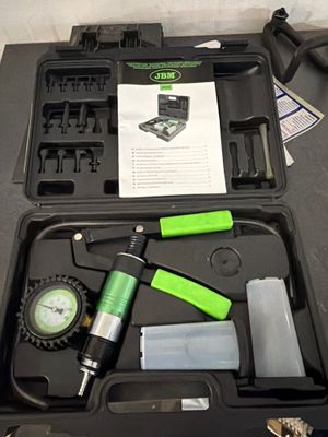 a tool kit in a black case on a table
