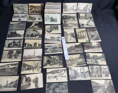 a lot of old black and white pictures on the table