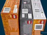 three boxes of legos stacked on top of each other