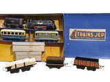 a box with a train set in it on a white background
