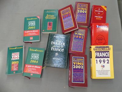 several books are sitting on a table next to a pair of scissors