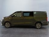 a picture of a dark colored van parked in a parking lot