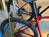 a bike that is sitting on a stand in a garage