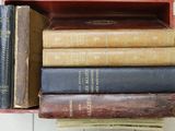 a stack of books sitting on top of each other on a shelf