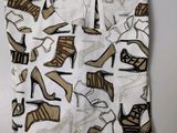 white shorts with high heels and high heels print on them