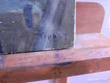 a picture of a painting on a wooden table