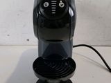 an image of a black coffee maker on a table