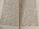 a book open on a table with some writing on it
