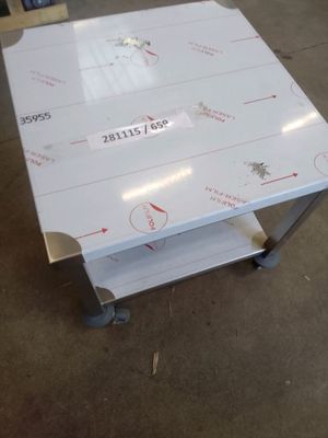 a table that has a lot of stickers on it