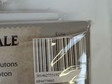 a label on the back of a bag of cotton