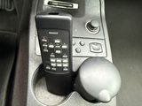 a cell phone in the center console of a car