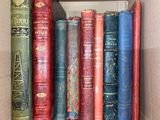 a box full of books that are sitting on a shelf