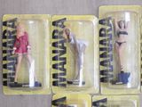 six action figures of a woman in a bikini and a man in a bathing suit