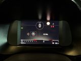 a digital display on the dashboard of a car