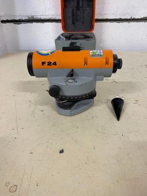 a close up of an orange and black object on a table
