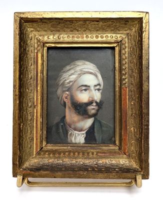 portrait of a man in a turban, in a gold frame