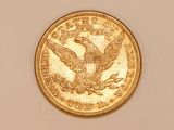 an image of a gold coin with an eagle on it