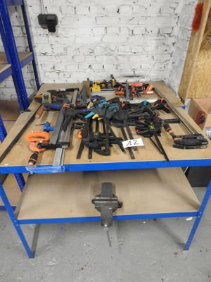 a table with a bunch of tools on top of it