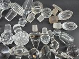 a lot of clear glass pieces on a table