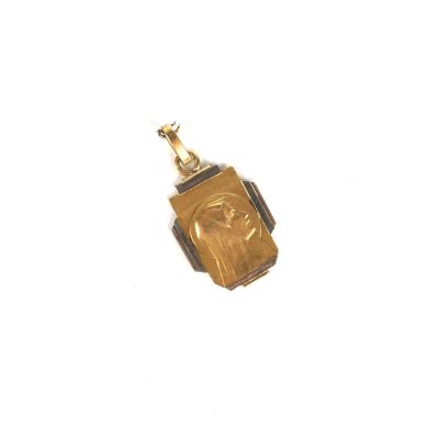 une image représentant un cadenas doré sur lequel figure le portrait d'un homme