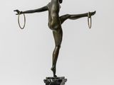 an image of a statue of a woman with a hoop on her head