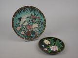 a small plate and a small bowl sitting on a table