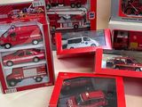 a lot of red and white fire trucks in the boxes